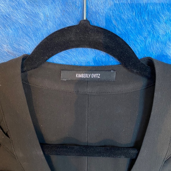 Black minidress with intricate bands of fabric on the front of the dress. - Picture 3 of 3